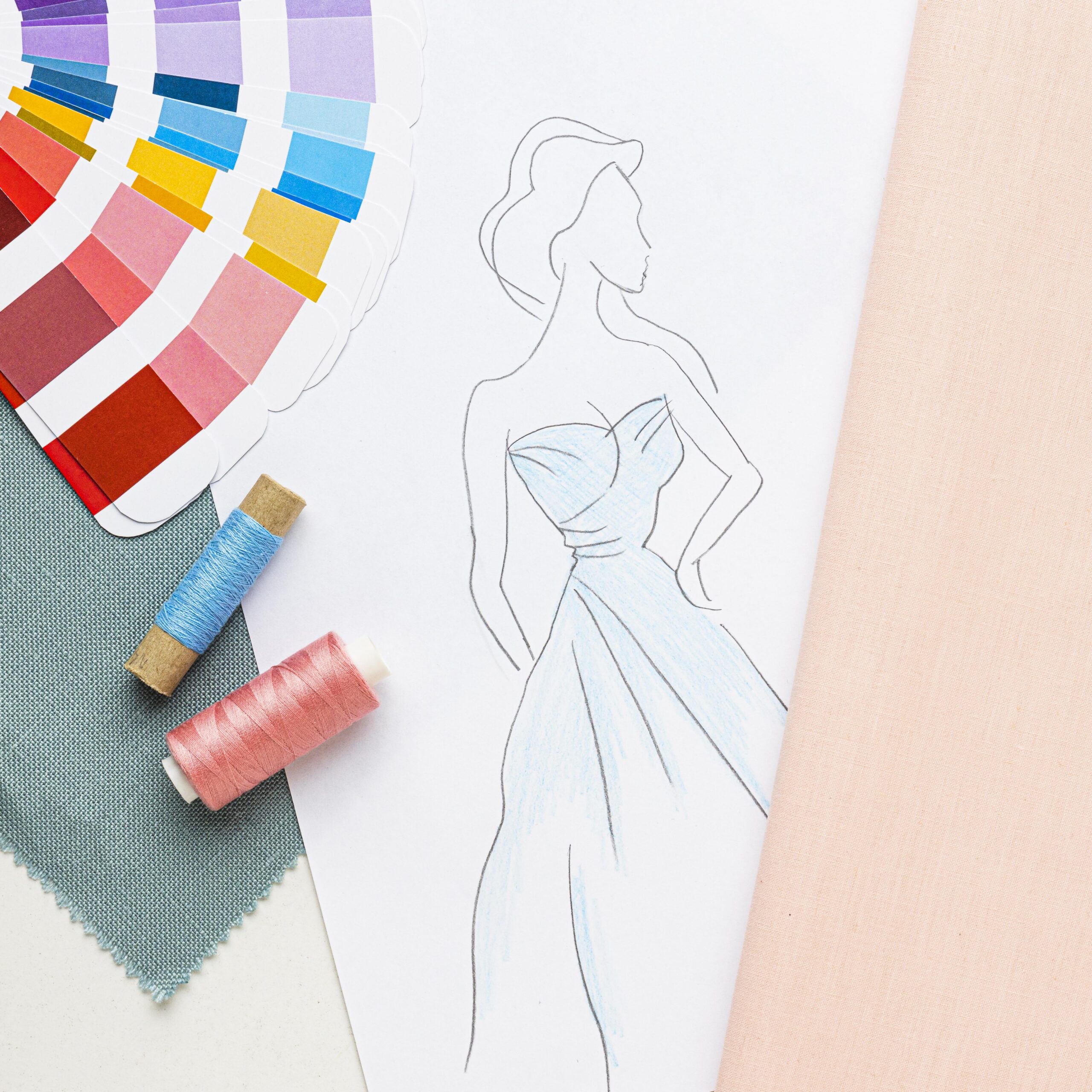 top view sewing set with fabric samples thread